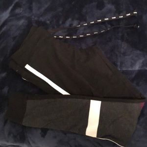 Women’s PINK yoga leggings with strings.